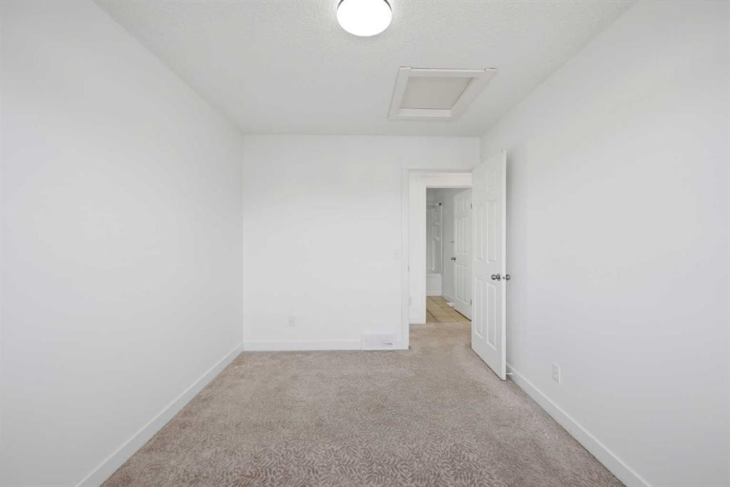 50 Saddleback Road Ne, Calgary, AB - Indoor Photo Showing Other Room