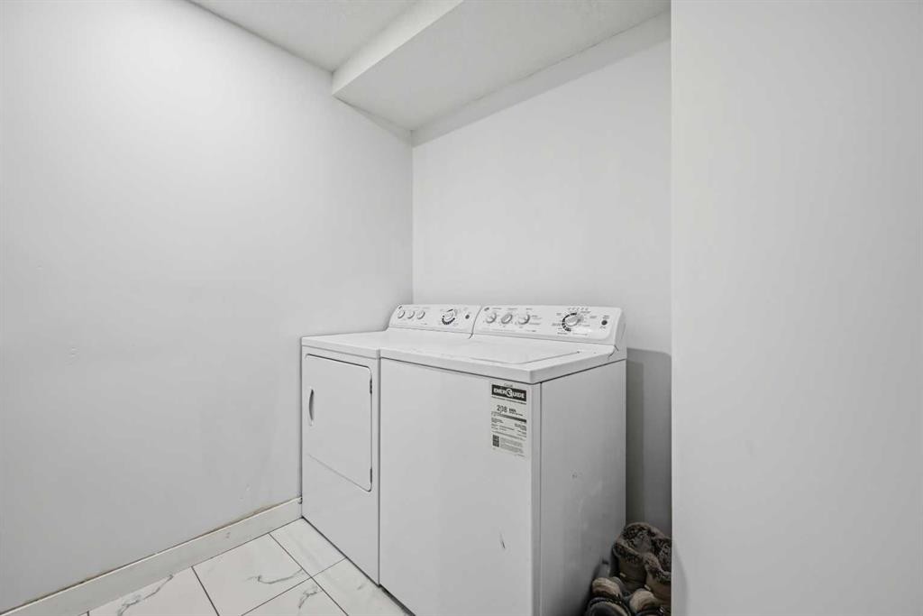 50 Saddleback Road Ne, Calgary, AB - Indoor Photo Showing Laundry Room