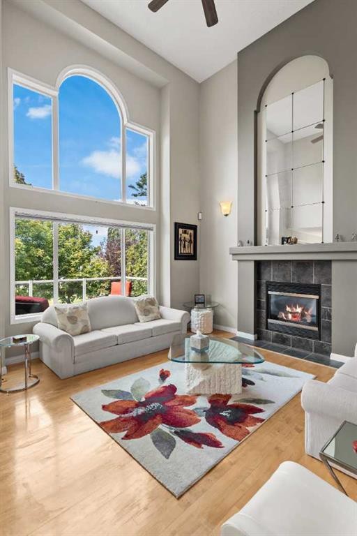 180 Cranfield Park Se, Calgary, AB - Indoor Photo Showing Living Room With Fireplace
