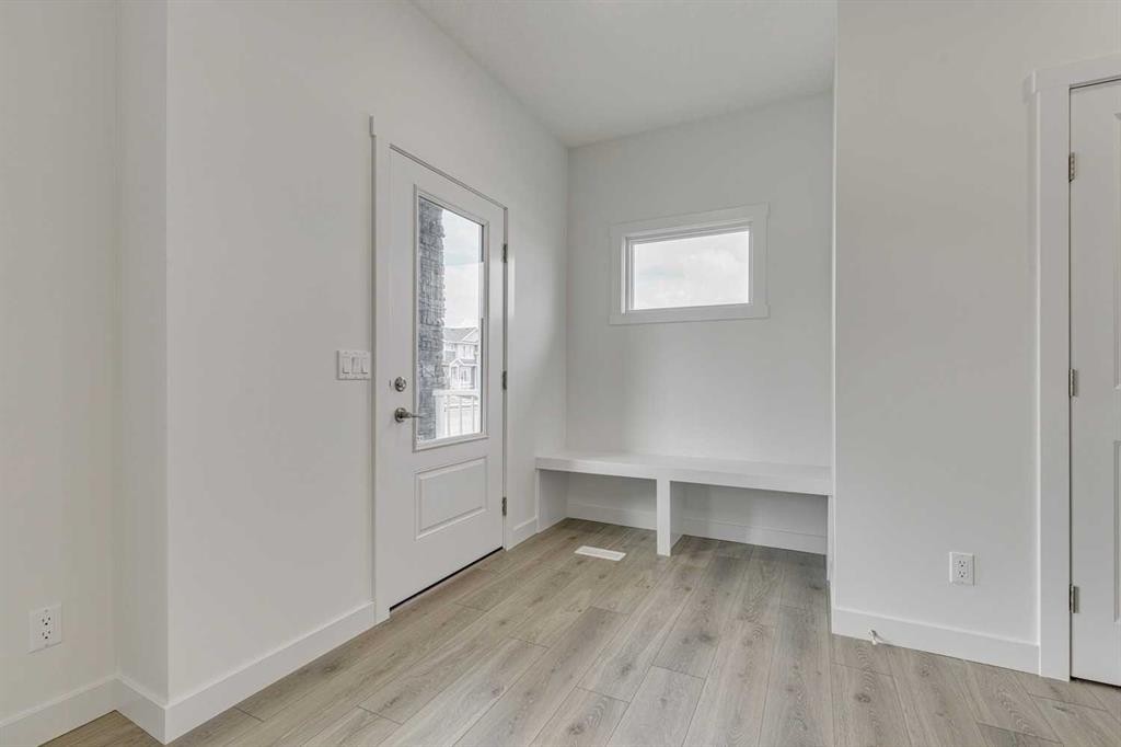 208 Belmont Way Sw, Calgary, AB - Indoor Photo Showing Other Room