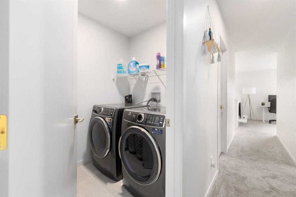30 Edith Manor Nw, Calgary, AB - Indoor Photo Showing Laundry Room