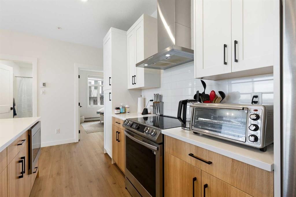 6103-200 Seton Circle Se, Calgary, AB - Indoor Photo Showing Kitchen With Upgraded Kitchen