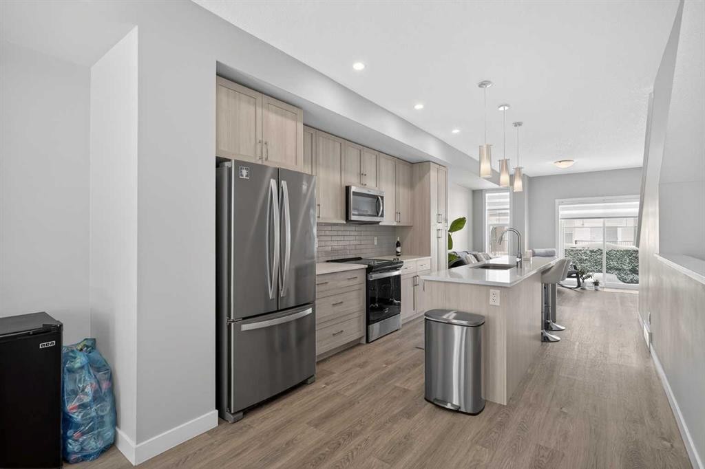 930 Sage Hill Grove Nw, Calgary, AB - Indoor Photo Showing Kitchen With Stainless Steel Kitchen With Upgraded Kitchen