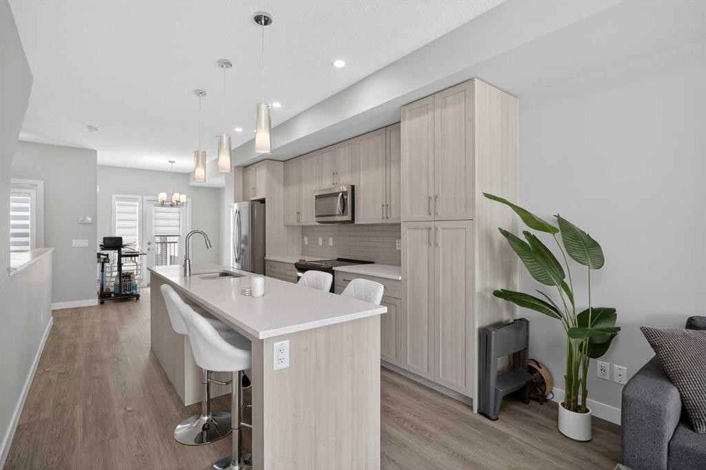 930 Sage Hill Grove Nw, Calgary, AB - Indoor Photo Showing Kitchen With Double Sink With Upgraded Kitchen