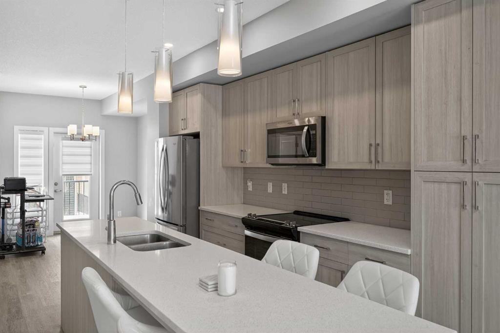 930 Sage Hill Grove Nw, Calgary, AB - Indoor Photo Showing Kitchen With Stainless Steel Kitchen With Double Sink With Upgraded Kitchen