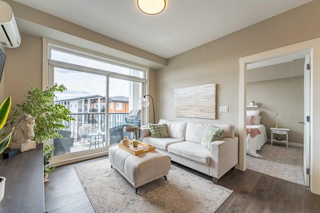 412-10 Walgrove Walk Se, Calgary, AB - Indoor Photo Showing Living Room