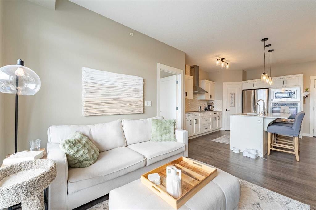 412-10 Walgrove Walk Se, Calgary, AB - Indoor Photo Showing Living Room
