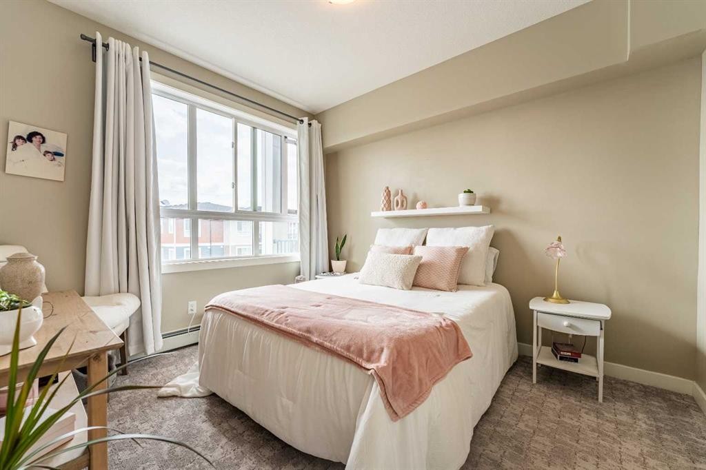 412-10 Walgrove Walk Se, Calgary, AB - Indoor Photo Showing Bedroom