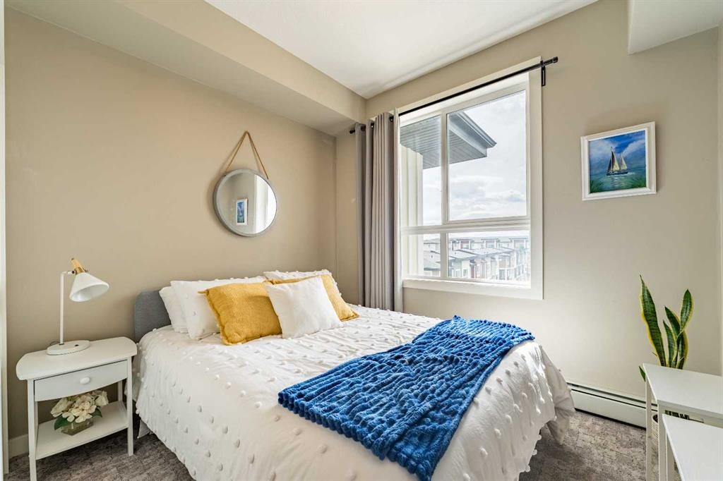 412-10 Walgrove Walk Se, Calgary, AB - Indoor Photo Showing Bedroom