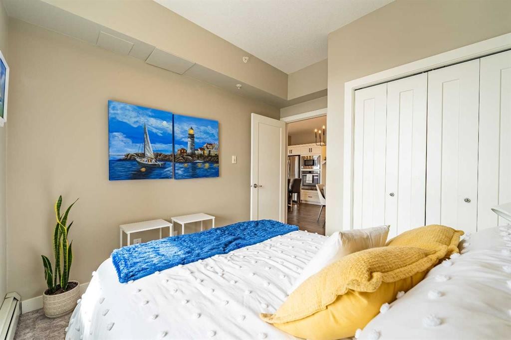 412-10 Walgrove Walk Se, Calgary, AB - Indoor Photo Showing Bedroom