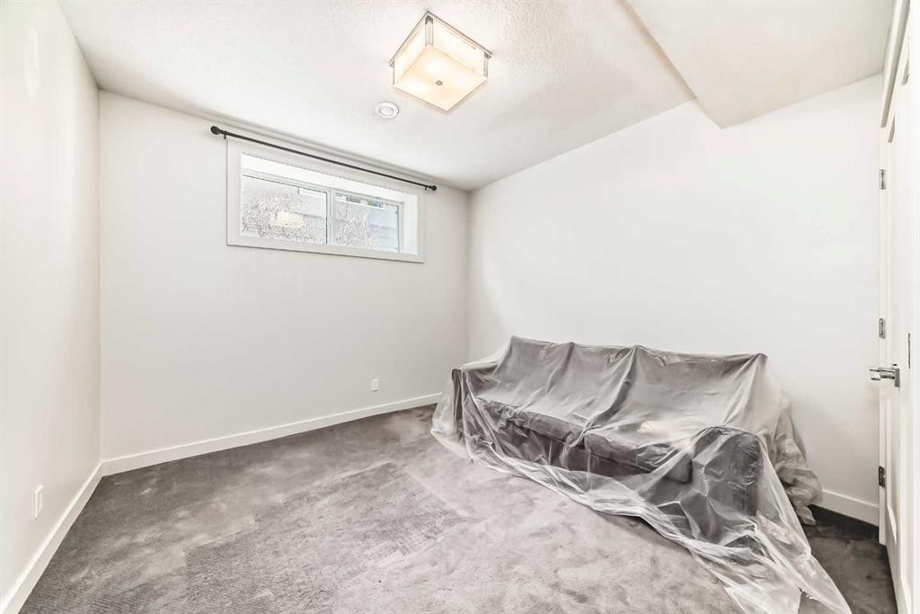 112 Hanover Road Sw, Calgary, AB - Indoor Photo Showing Other Room
