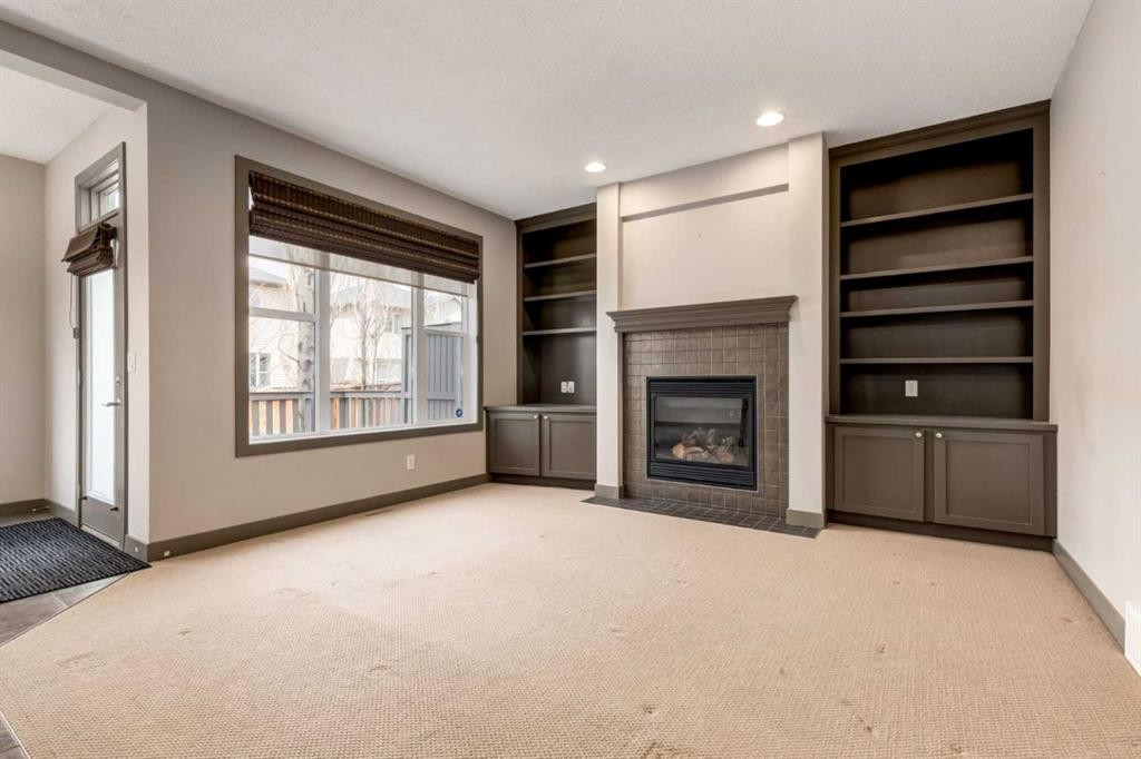 33 Everoak Circle Sw, Calgary, AB - Indoor With Fireplace