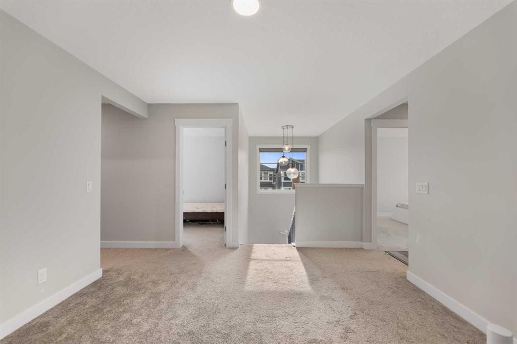 7 Corner Glen Common Ne, Calgary, AB - Indoor Photo Showing Other Room