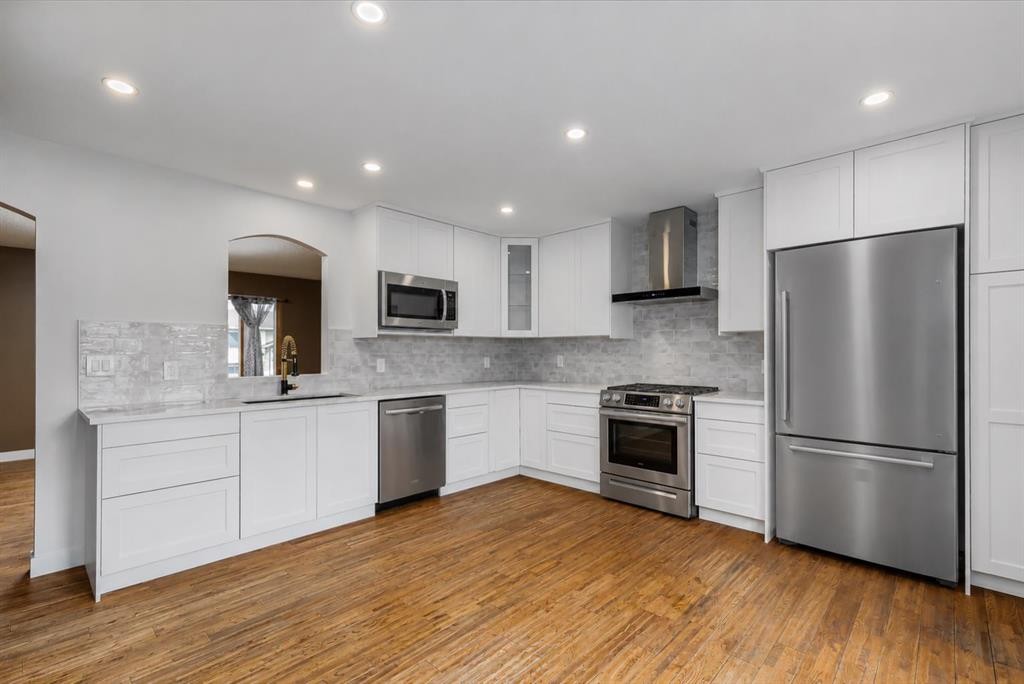 41 Alpine Crescent Se, Airdrie, AB - Indoor Photo Showing Kitchen With Stainless Steel Kitchen With Upgraded Kitchen