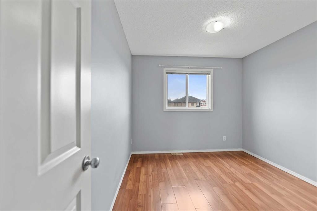 116 Saddlebrook Common Ne, Calgary, AB - Indoor Photo Showing Other Room