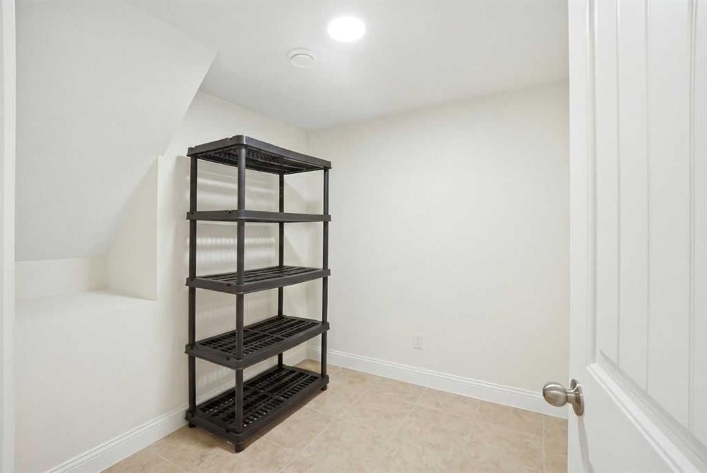 39 Saddlemont Close Ne, Calgary, AB - Indoor Photo Showing Other Room