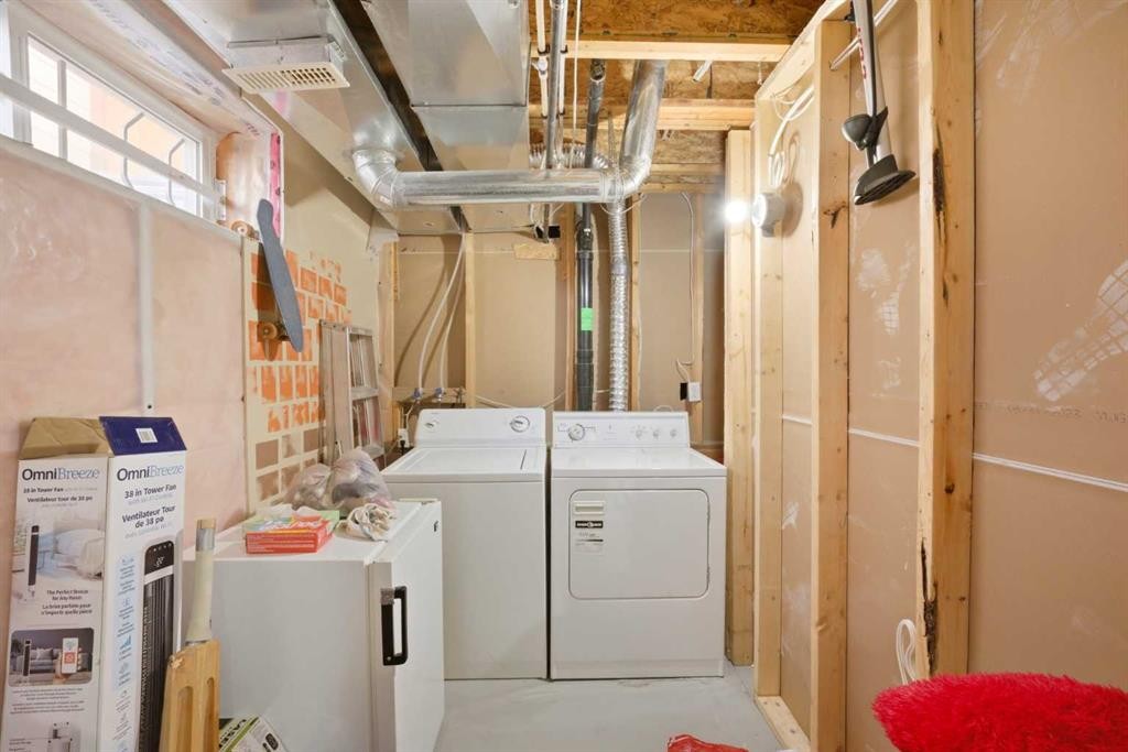 39 Saddlemont Close Ne, Calgary, AB - Indoor Photo Showing Laundry Room