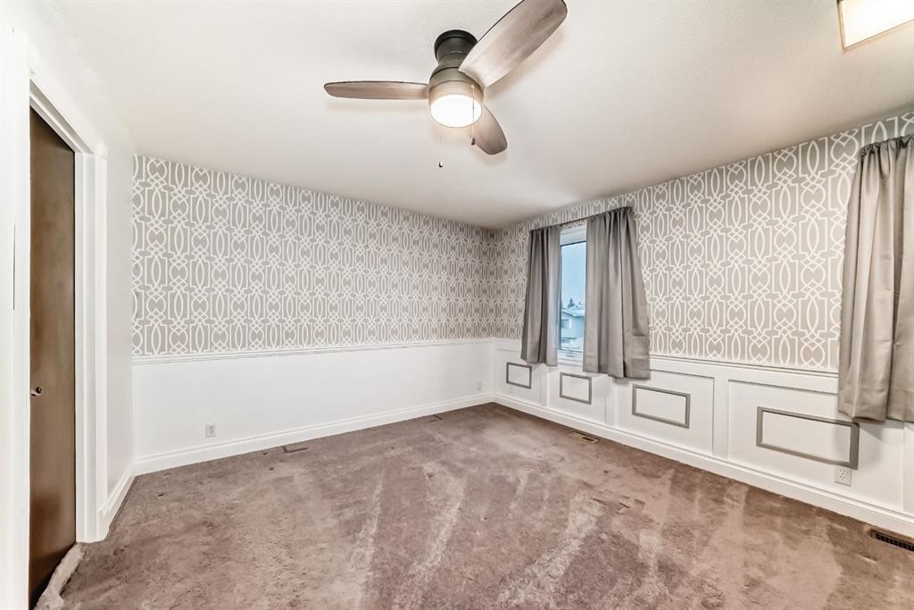 255 Falshire Way Ne, Calgary, AB - Indoor Photo Showing Other Room