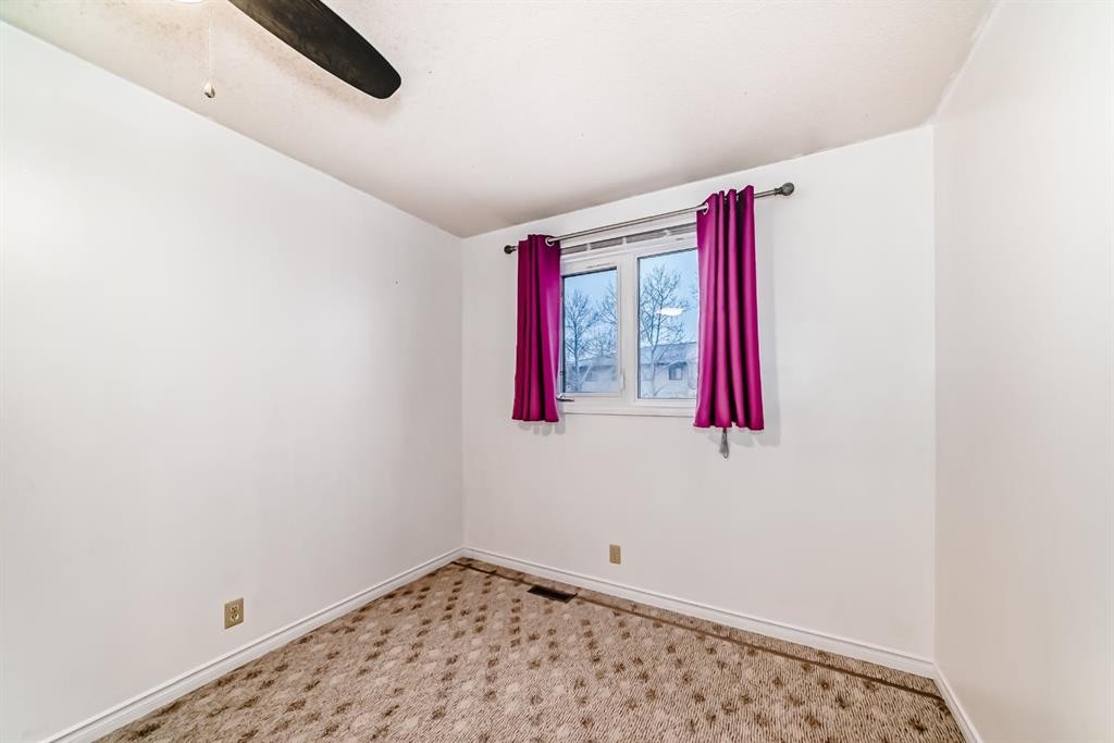 255 Falshire Way Ne, Calgary, AB - Indoor Photo Showing Other Room