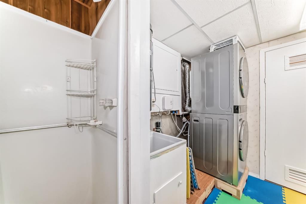 255 Falshire Way Ne, Calgary, AB - Indoor Photo Showing Laundry Room