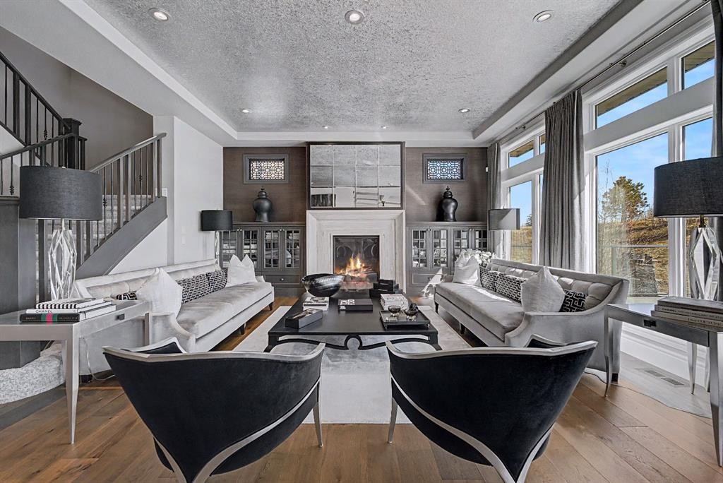 33 Waters Edge Drive, Heritage Pointe, AB - Indoor Photo Showing Living Room With Fireplace
