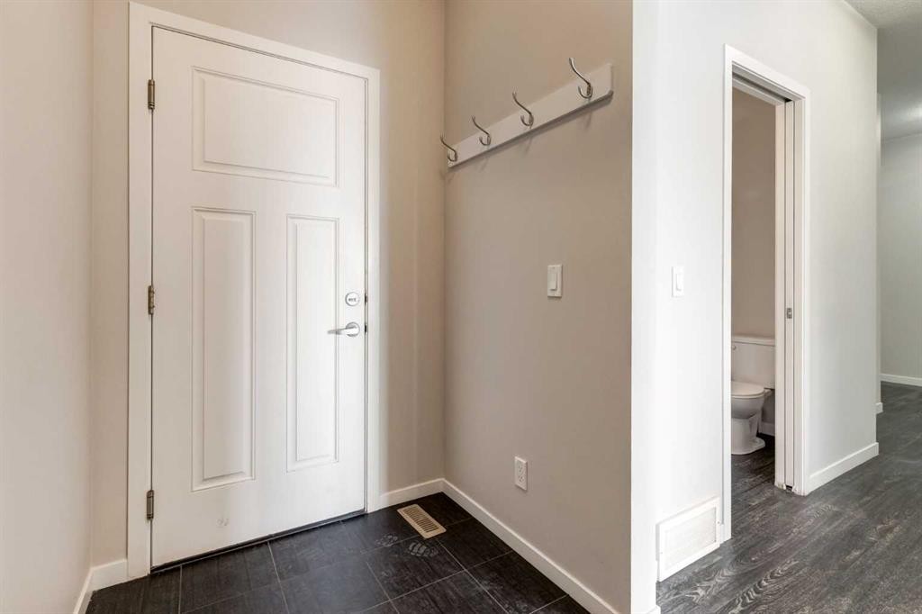 70 Howse Common Ne, Calgary, AB - Indoor Photo Showing Other Room