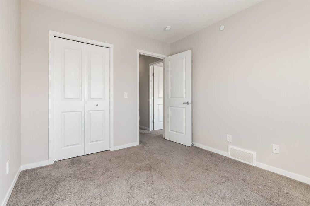 70 Howse Common Ne, Calgary, AB - Indoor Photo Showing Other Room