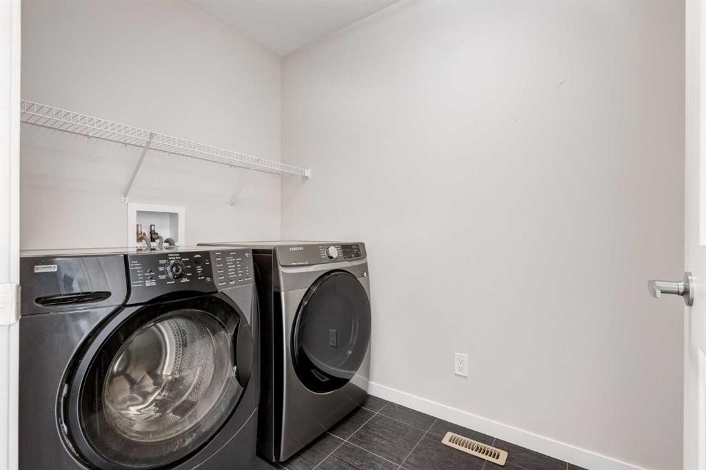 70 Howse Common Ne, Calgary, AB - Indoor Photo Showing Laundry Room