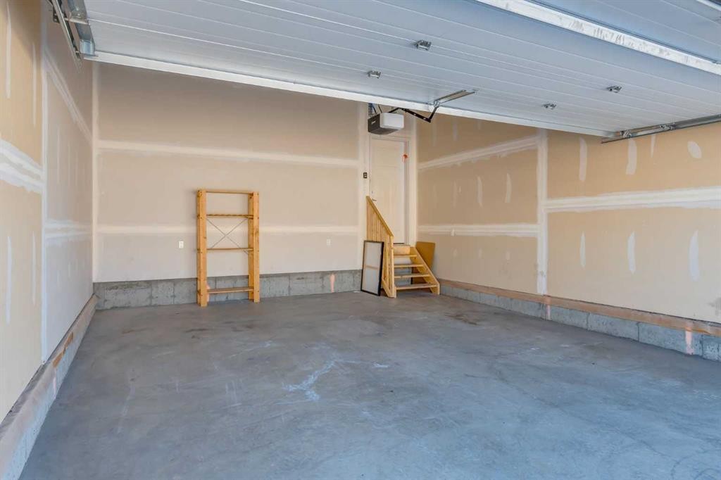 70 Howse Common Ne, Calgary, AB - Indoor Photo Showing Garage