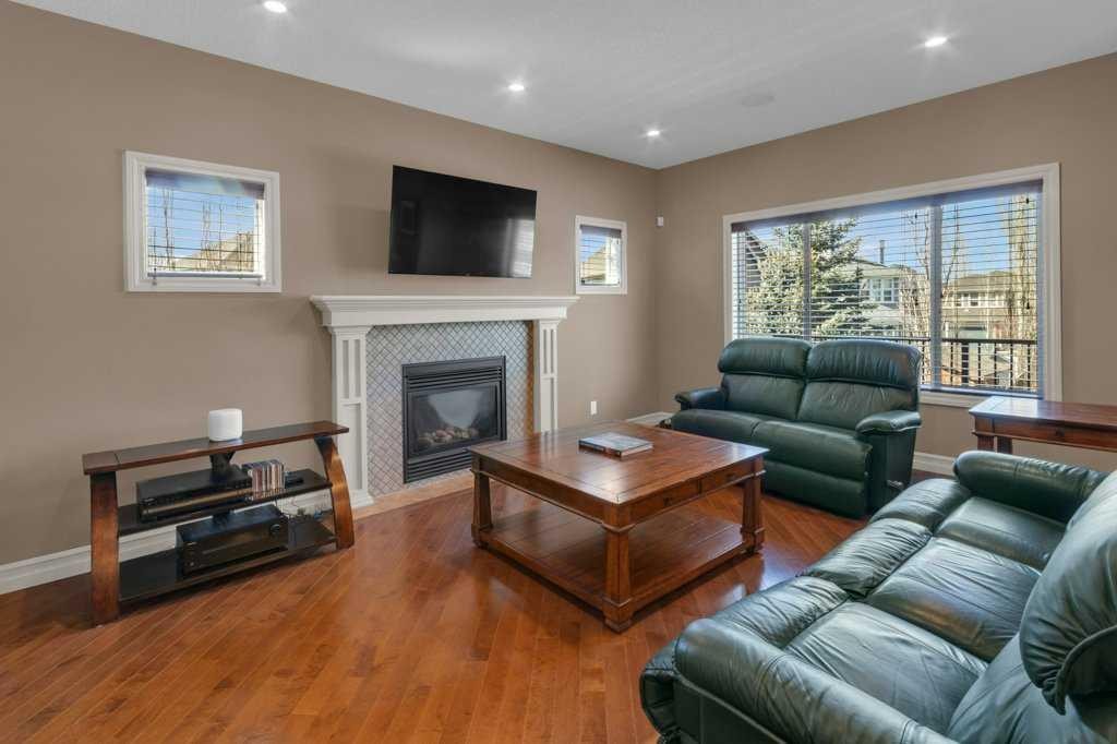 44 Mahogany Rise Se, Calgary, AB - Indoor Photo Showing Living Room With Fireplace