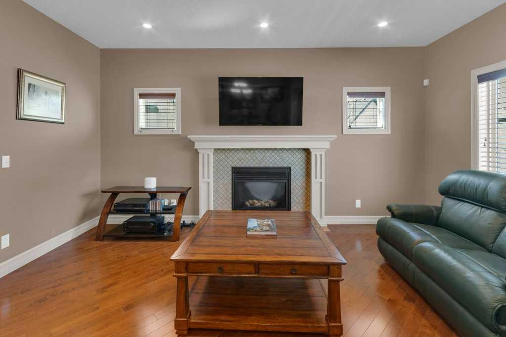 44 Mahogany Rise Se, Calgary, AB - Indoor Photo Showing Living Room With Fireplace