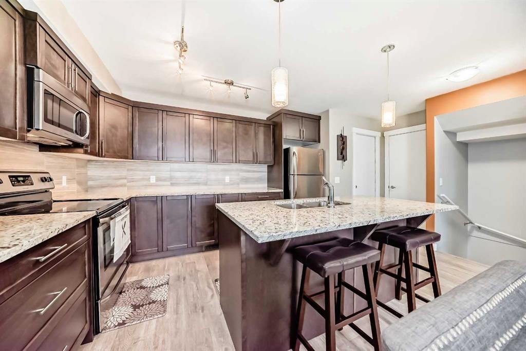 222 Redstone View Ne, Calgary, AB - Indoor Photo Showing Kitchen With Double Sink With Upgraded Kitchen