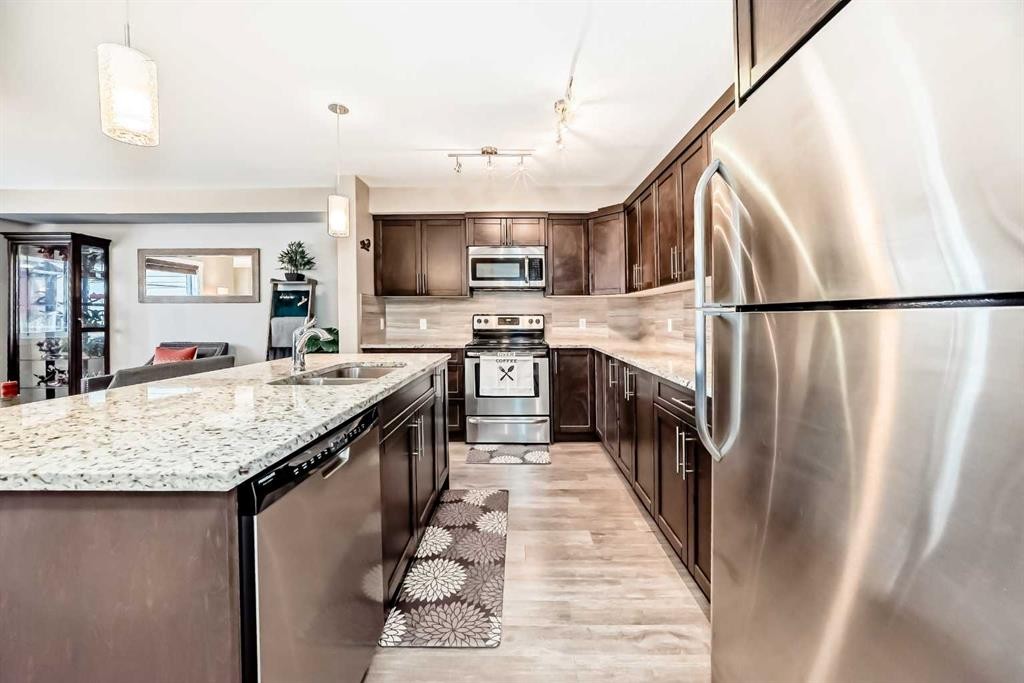 222 Redstone View Ne, Calgary, AB - Indoor Photo Showing Kitchen With Double Sink With Upgraded Kitchen