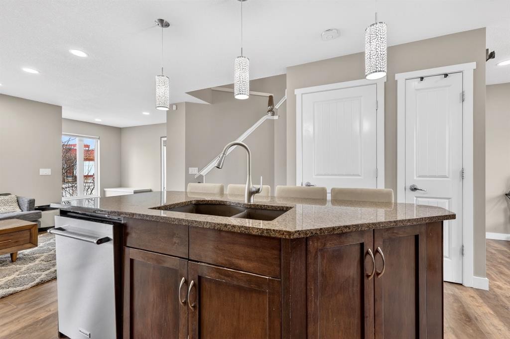 180 Walden Gate Se, Calgary, AB - Indoor Photo Showing Kitchen With Double Sink