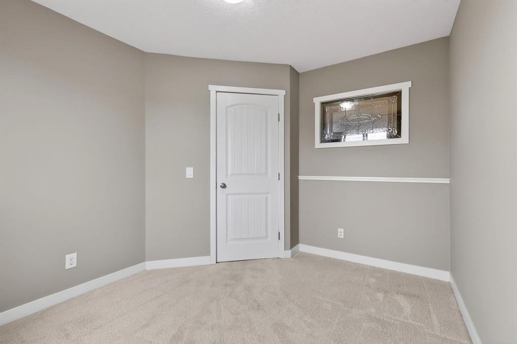 180 Walden Gate Se, Calgary, AB - Indoor Photo Showing Other Room