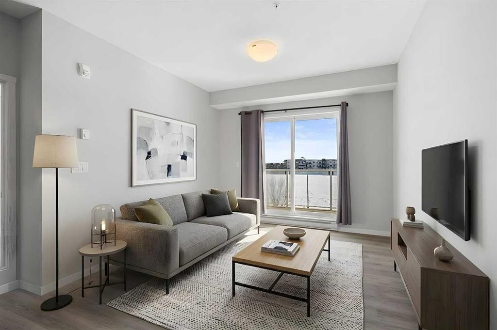 305-20 Seton Park Se, Calgary, AB - Indoor Photo Showing Living Room