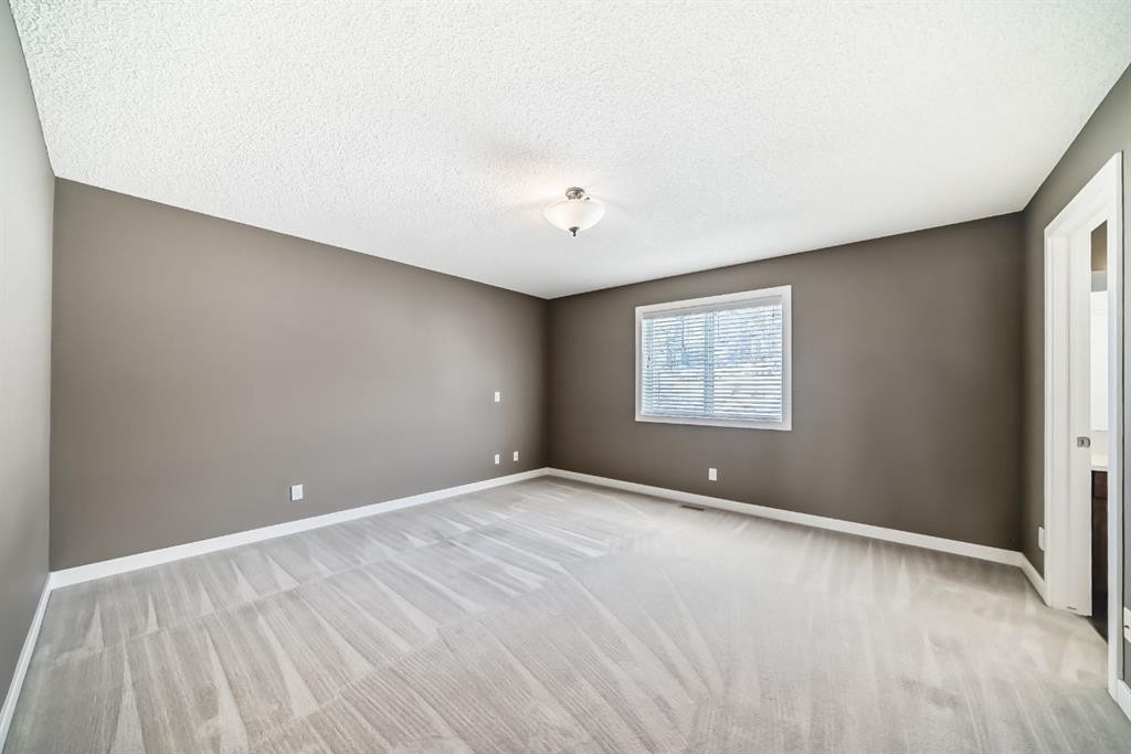 259 St Moritz Drive Sw, Calgary, AB - Indoor Photo Showing Other Room