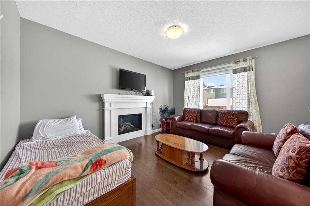 72 Redstone Drive Ne, Calgary, AB - Indoor Photo Showing Living Room With Fireplace