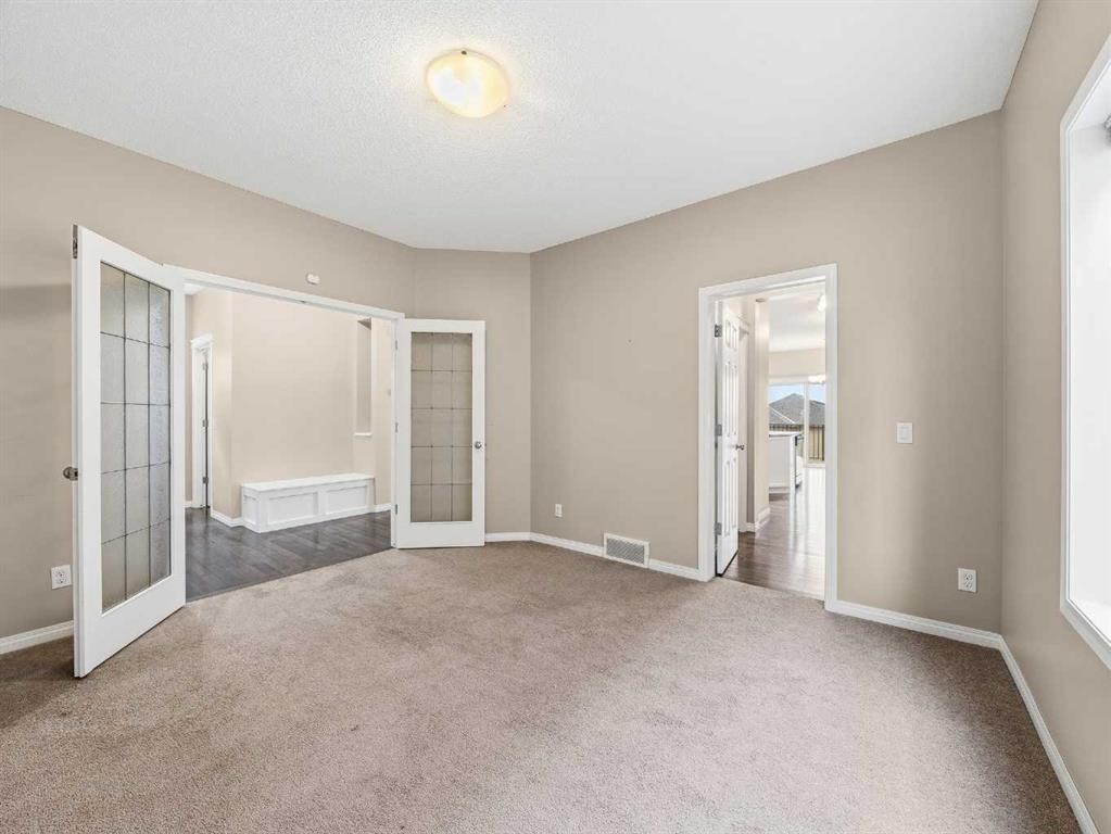 32 Panatella Parade Nw, Calgary, AB - Indoor Photo Showing Other Room