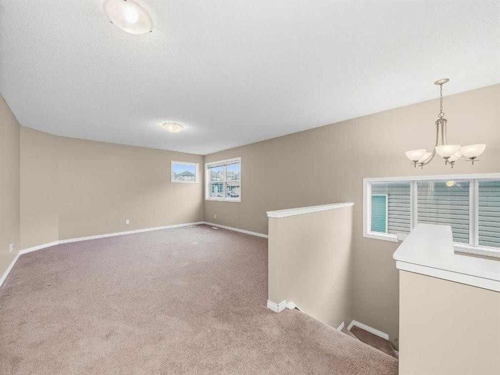 32 Panatella Parade Nw, Calgary, AB - Indoor Photo Showing Other Room