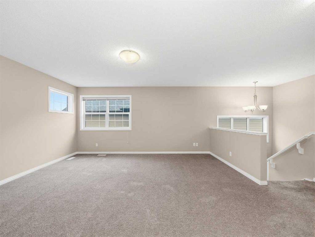 32 Panatella Parade Nw, Calgary, AB - Indoor Photo Showing Other Room