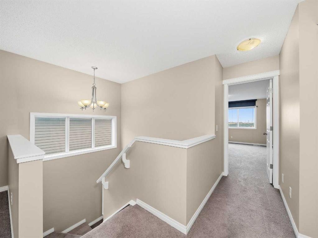 32 Panatella Parade Nw, Calgary, AB - Indoor Photo Showing Other Room