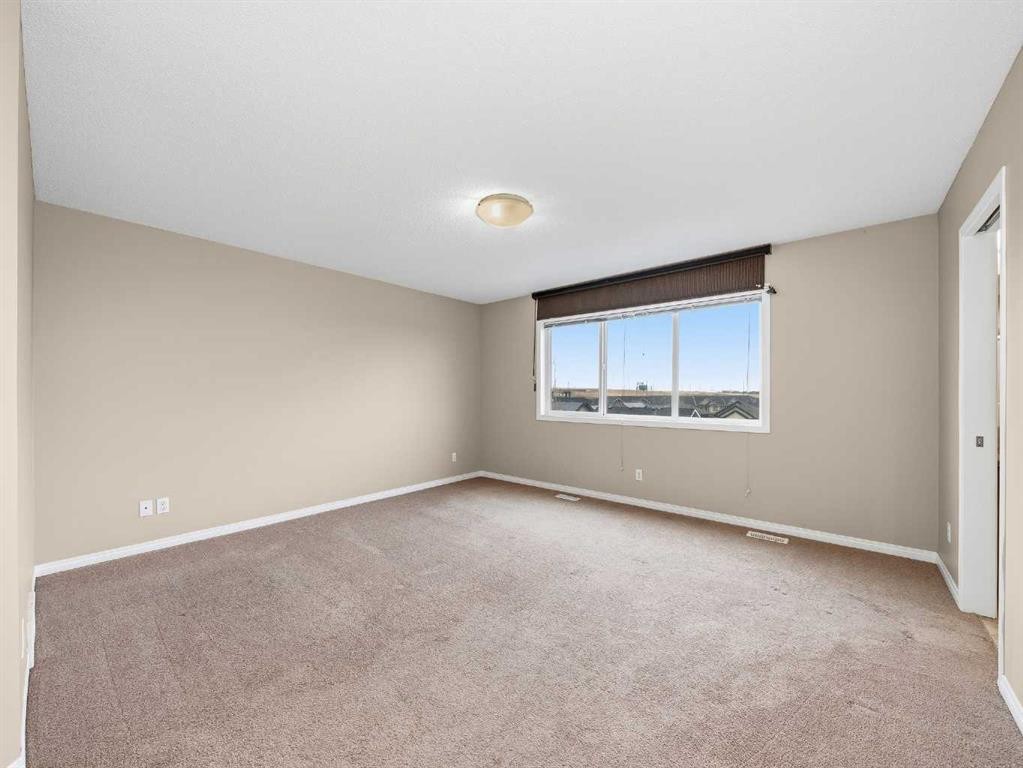 32 Panatella Parade Nw, Calgary, AB - Indoor Photo Showing Other Room