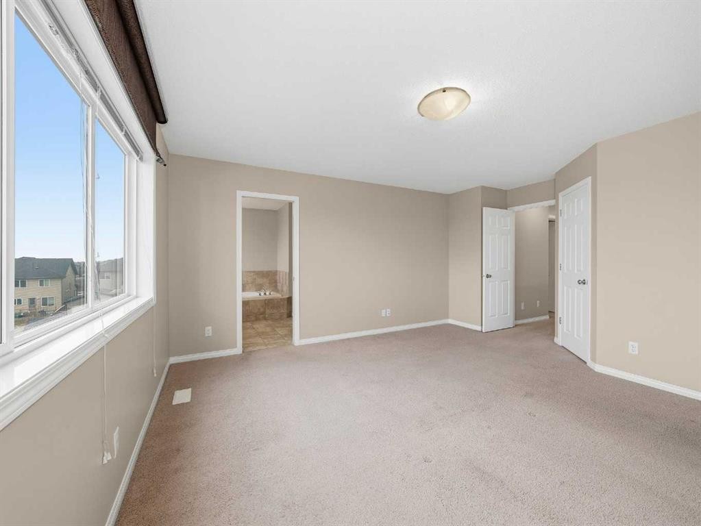 32 Panatella Parade Nw, Calgary, AB - Indoor Photo Showing Other Room
