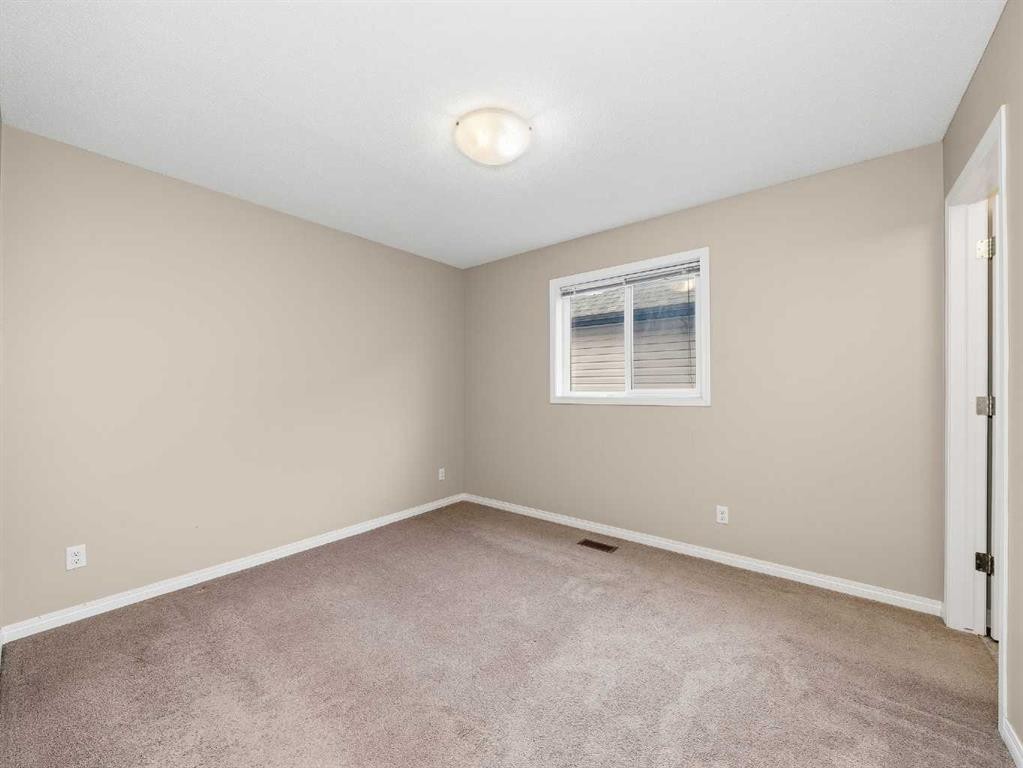 32 Panatella Parade Nw, Calgary, AB - Indoor Photo Showing Other Room