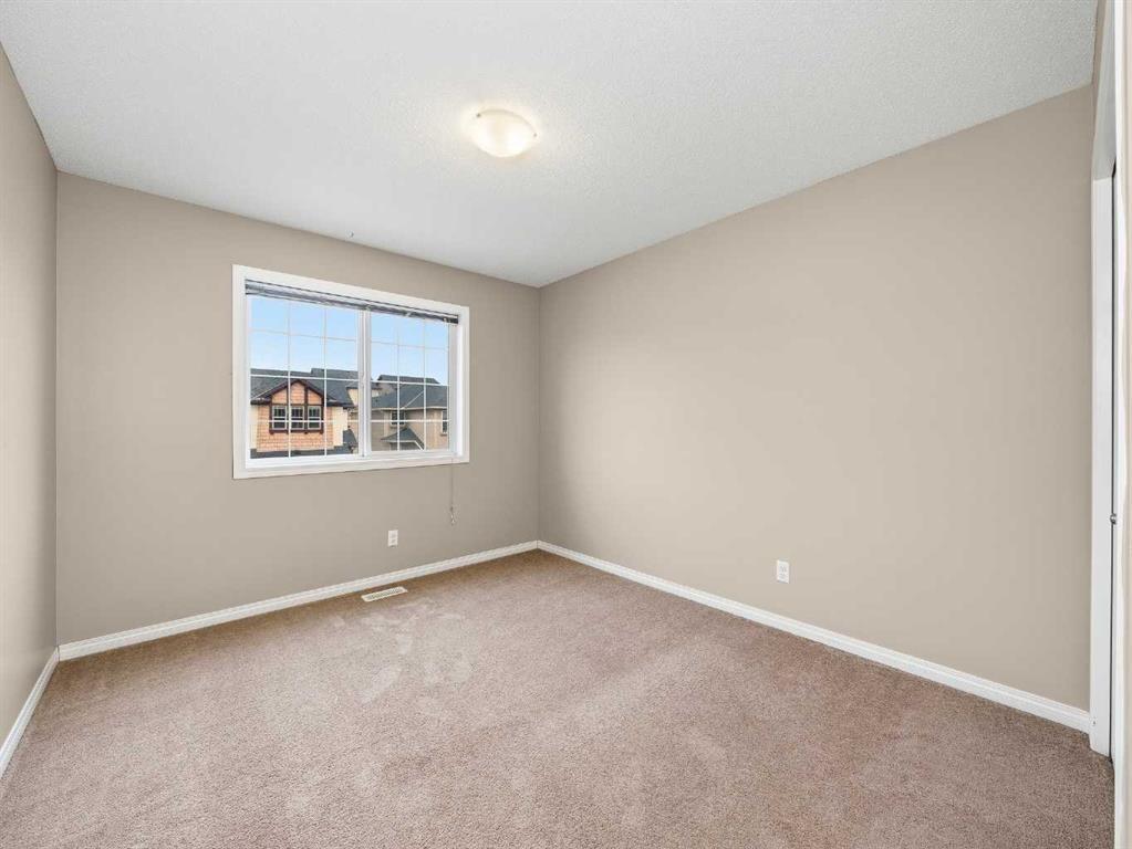 32 Panatella Parade Nw, Calgary, AB - Indoor Photo Showing Other Room