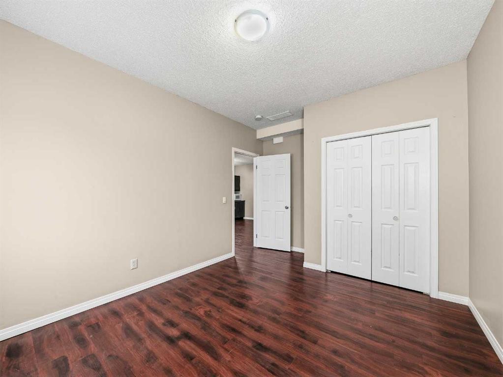 32 Panatella Parade Nw, Calgary, AB - Indoor Photo Showing Other Room
