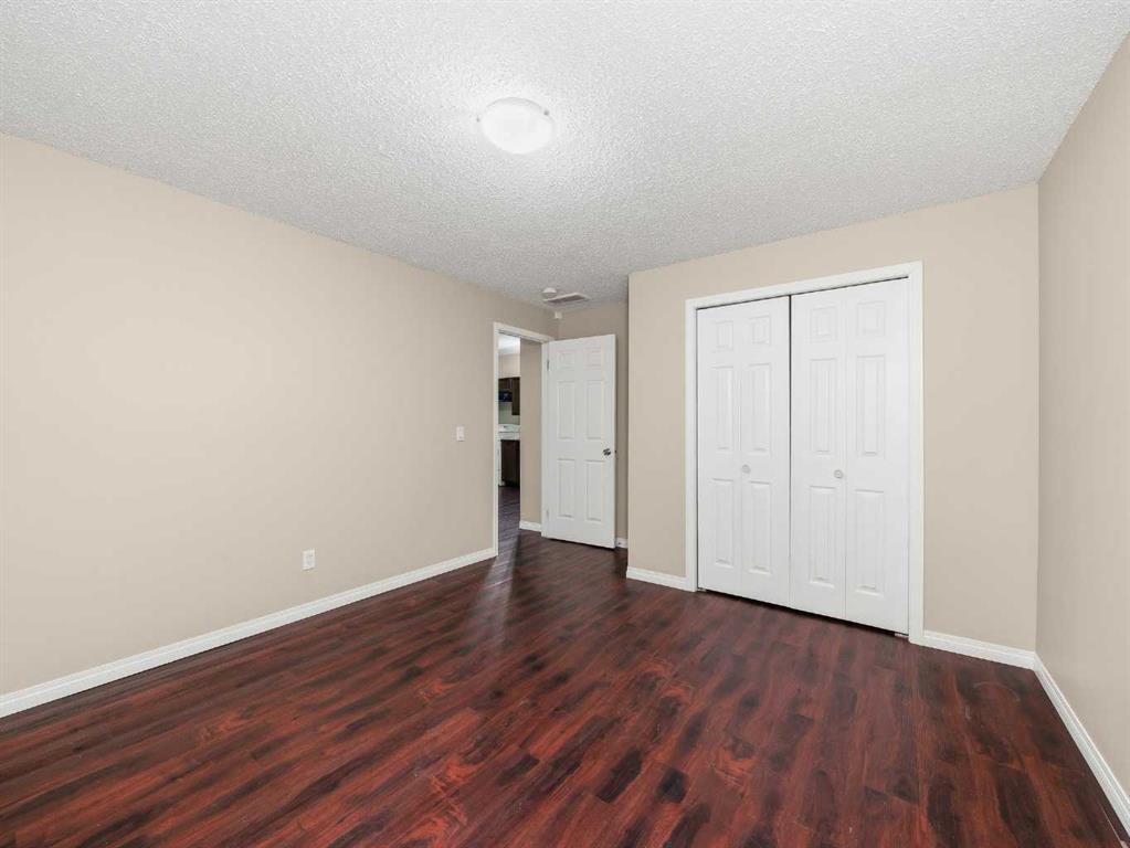 32 Panatella Parade Nw, Calgary, AB - Indoor Photo Showing Other Room