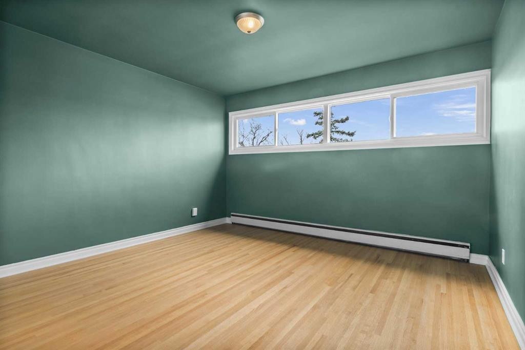 67 Hooke Road Sw, Calgary, AB - Indoor Photo Showing Other Room