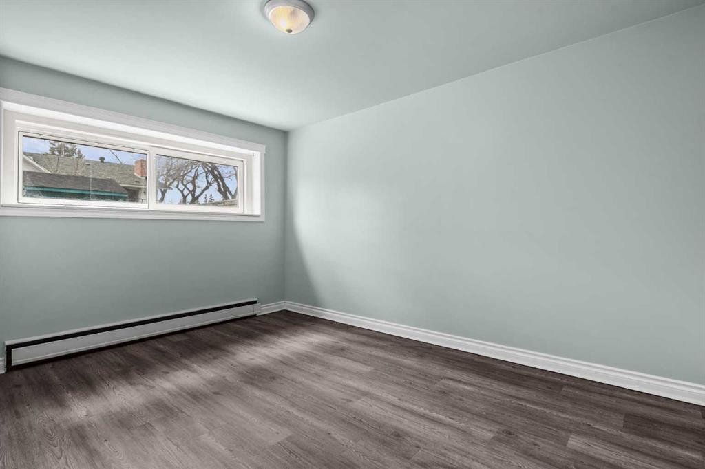 67 Hooke Road Sw, Calgary, AB - Indoor Photo Showing Other Room